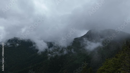 Time-lapse video of mountains in fog