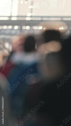 Crowd walking on city bridge
