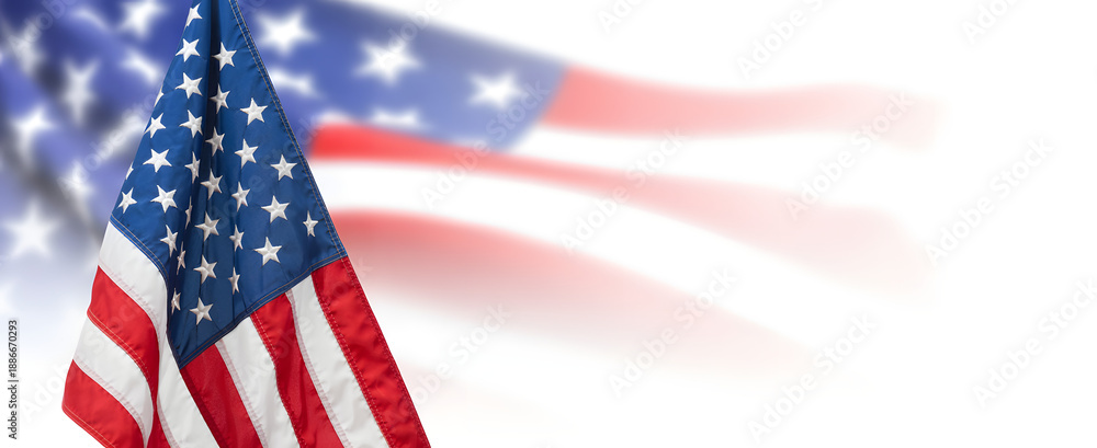 Obraz premium American flag waving in the wind with stars and stripes