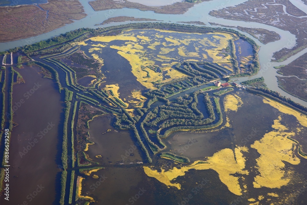 Naklejka premium Aquaculture - fish farm in the Venetian Lagoon, Italy. Aerial view.