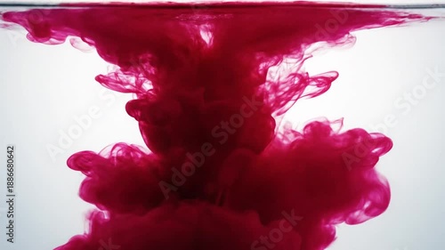 Wallpaper Mural Vibrant red ink flows into clear water creating an abstract underwater cloud from above Torontodigital.ca