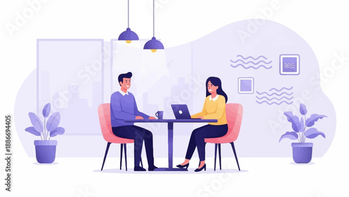 Two people at a table with a laptop and coffee