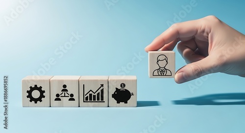 HR professional selecting leader from wooden blocks representing core business functions and financial management