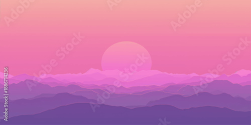 A beautiful pink sunrise glows over misty mountain peaks as the morning light illuminates the orange clouds and blue sky above a peaceful nature landscape valley