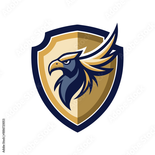 Powerful eagle head mascot logo on a gold shield emblem vector illustration for sports and gaming