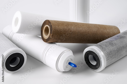 Obraz na plátně Several new and used dirty water filter cartridges.