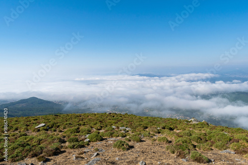 View from the mountain of clouds covering a valley in Val Miñor. Alto da Groba - Baiona - Spain