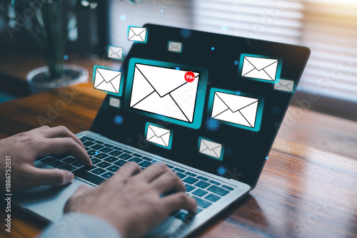 Email marketing concept showing laptop with inbox notifications and unread messages, symbolizing digital communication, business correspondence, customer support, online messaging overload