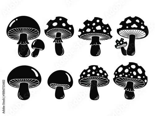 Collection of various black mushroom silhouettes on with different shapes and sizes