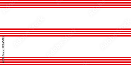 Vertical red and white stripes background. Seamless and repeating pattern. Christmas holiday Vector Pattern.