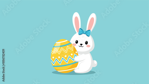 Cute white bunny with a blue bow on its head standing next to a large decorated easter egg for young children.