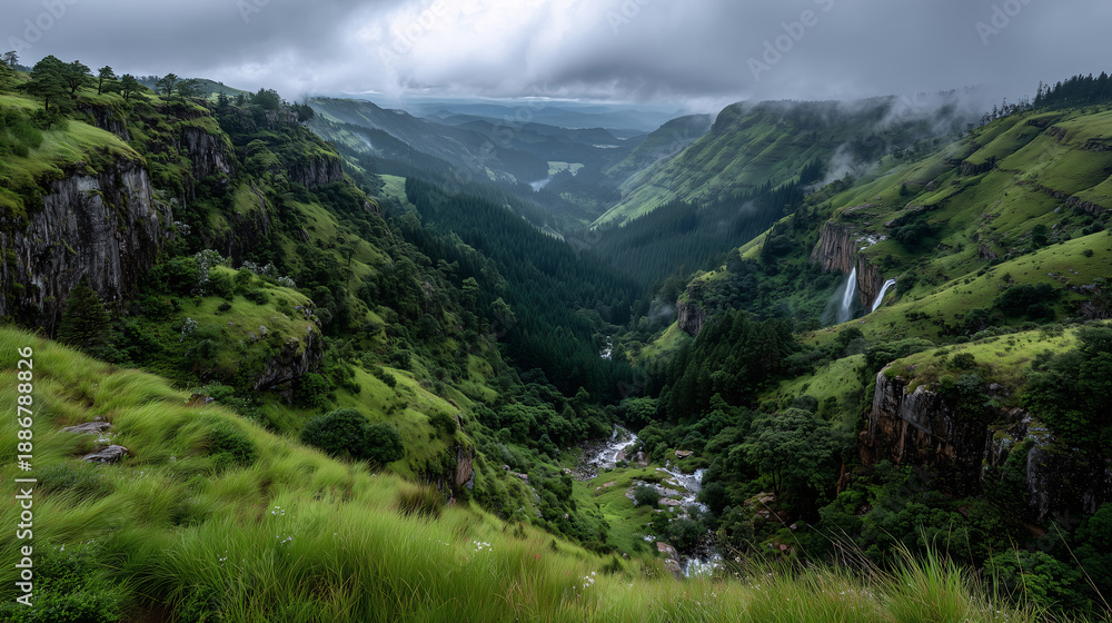 Obraz premium Majestic Valley Vista: A breathtaking panoramic view of a lush, verdant valley stretches out, showcasing the raw beauty of the natural world. This scene evokes a sense of peace.