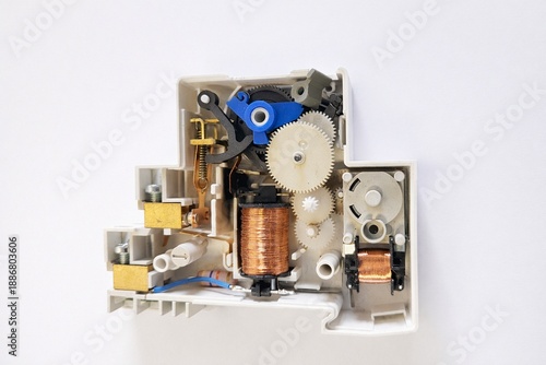 Internal View of Electrical Mechanical Device with Gears and Copper Coils