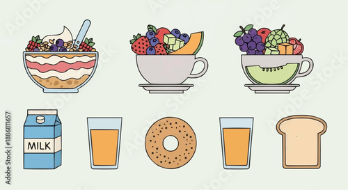 Assorted breakfast foods including fruits, pastries, and beverages displayed on a simple background from a straightforward viewpoint