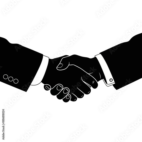 Two businesspeople shaking hands in a formal agreement