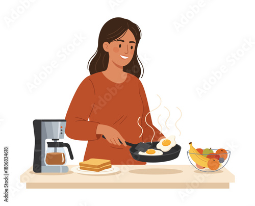 Woman cooking sunny side up eggs for breakfast