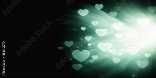 An abstract blue bokeh background featuring a bright blur of glowing light circles and shiny water bubbles creates a defocused glowing glitter texture effect with a Christmas design pattern