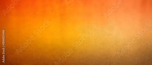 Grainy background with amber and apricot noise abstract gradient