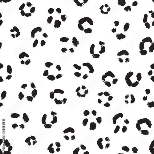 Cheetah leopard or jaguar skin pattern. Seamless black and white design for textile clothing and web usage. Grunge brush used, all hand drawn elements.