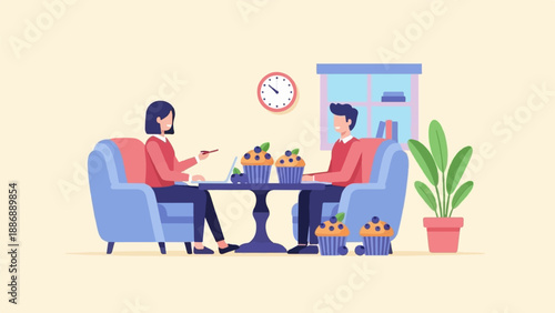 Two people sitting in chairs, sharing muffins and looking at a laptop