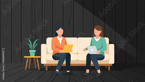 Two people sitting on a couch, working on laptops, with a plant nearby