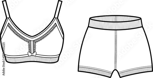 Detailed line of a delicate lace trimmed bra and matching waisted shorts presented as fashion underwear