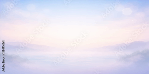 A beautiful summer cloudscape features white clouds drifting across a bright blue sky as golden sunlight illuminates the horizon over a peaceful sea landscape