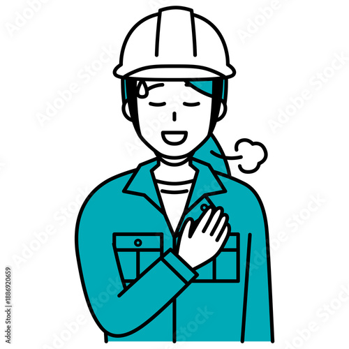 胸に手を当ててホッとする作業員の女性