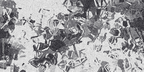 Abstract grayscale mosaic-like pattern with irregular dark shapes and speckled noise creating a fragmented and textured surface