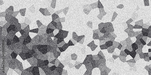 Abstract grayscale mosaic pattern with granular texture and irregular polygonal shapes creating a dynamic visual effect for backgrounds and design elements