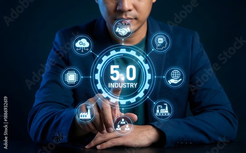 Wallpaper Mural Person’s hand interacts with a virtual interface displaying "industry 5.0" surrounded by various interconnected industrial technology icons. Torontodigital.ca