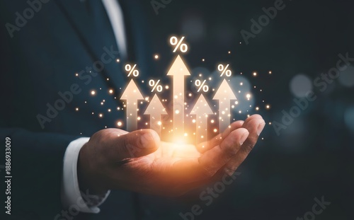 Wallpaper Mural An open hand is gently holding multiple glowing percentage symbols with upward-pointing arrows, signifying growth. Torontodigital.ca