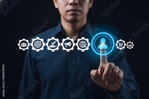 Wallpaper Mural Man points to a user icon within interconnected gears, representing customer-centric processes. Torontodigital.ca