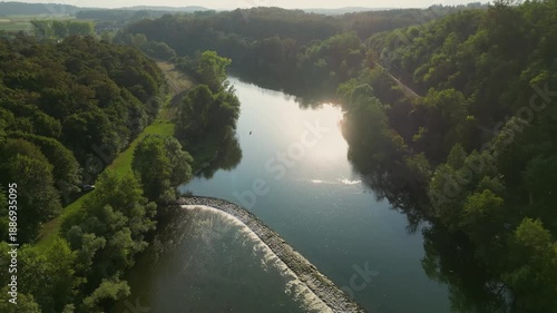 Wallpaper Mural Aerial view of the Kolpa River near Metlika, Slovenia, featuring a small river dam with flowing water, calm green river pools, surrounding forest, and a peaceful rural landscape in summer. Torontodigital.ca