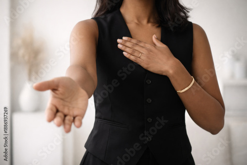 International Womens Day gesture showing woman reaching out, IWD 2026