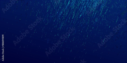 Deep blue underwater scene with particulate matter and light rays