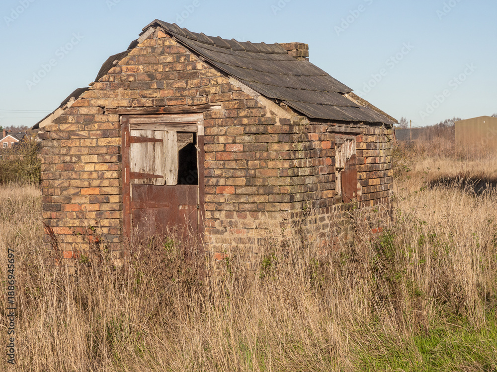 Obraz premium Old derelict brick storage building/ sub station, Wincham, Northwich, Chehsire, UK