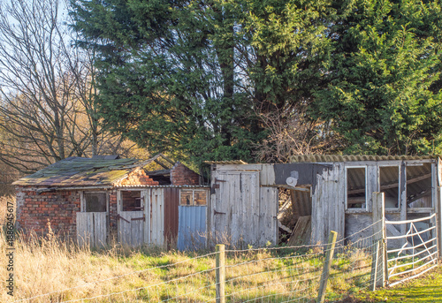 Old dewrelict wooden garage shed at Lower Wincham, Northwich, Chjeshire, UK