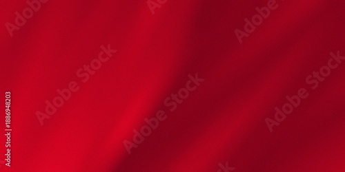 Abstract deep red grainy gradient background with luxury velvet texture