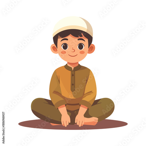 Smiling Young Muslim Boy Wearing Traditional Attire Sitting on a Prayer Mat