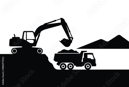 Excavator loading a dump truck during earthmoving operations at construction site