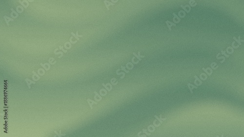Abstract grainy green gradient background with soft organic wave shadows.