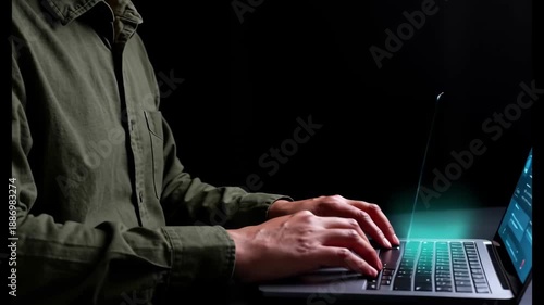 Wallpaper Mural Person types on a laptop, interacting with glowing chat bubbles for online support. Torontodigital.ca