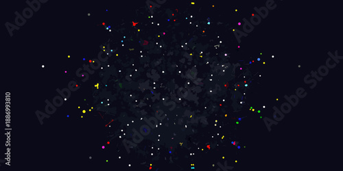 A vibrant scattering of colorful particles against a dark black background