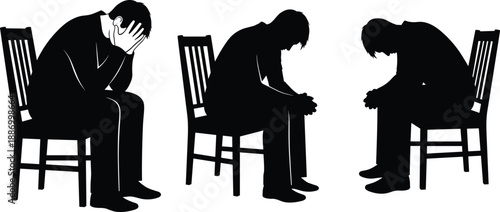 Black silhouettes of a man sitting on a chair in deep despair holding head in hands for mental health concepts