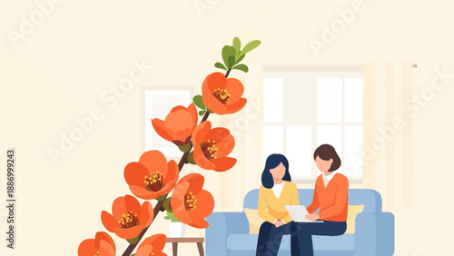 Two women sitting on a sofa with a branch of orange flowers in the foreground