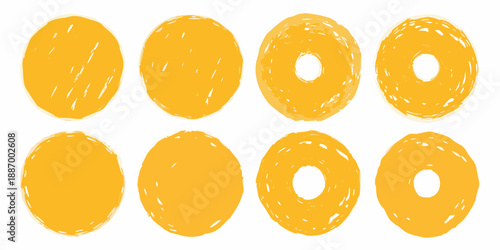 A collection of hand drawn style yellow circles and ring shapes