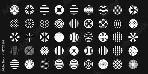 Collection of unique white egg shaped patterns on a black background