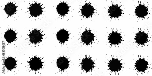 Abstract arrangement of irregular black ink blots on a white background