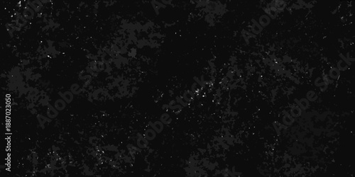 Dark abstract texture with subtle light variations and grainy background